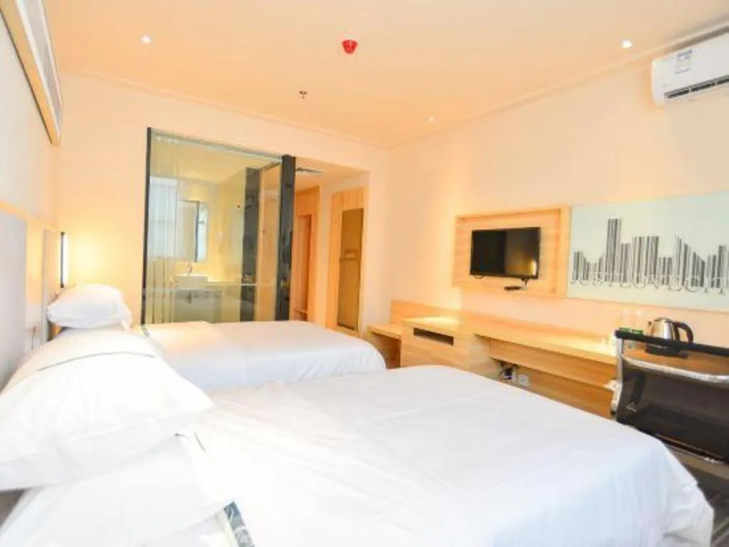 Bed in City Comfort Inn Zhuhai University Town Tangjiawan Plaza