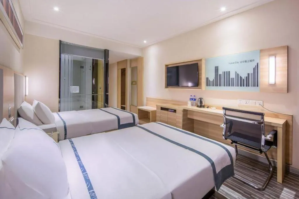 Bed in City Comfort Inn Wuzhou Bus Station