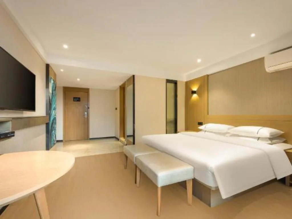 Bed in City Comfort Inn Liuzhou Wuxing Walking Street Zhonghuan Tower