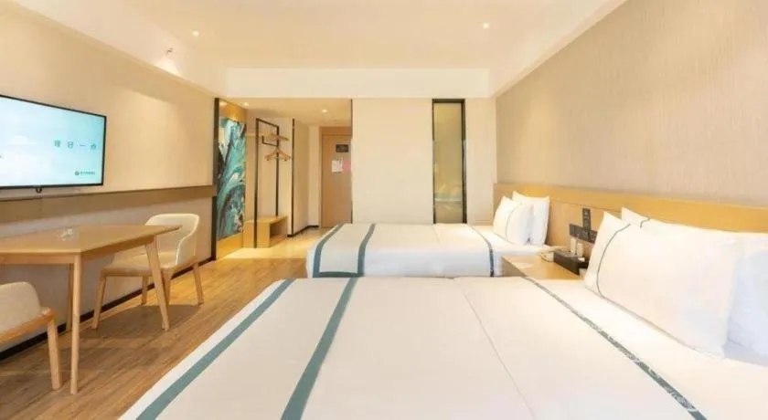 Bed in City Comfort Inn Liuzhou Wuxing Walking Street Zhonghuan Tower