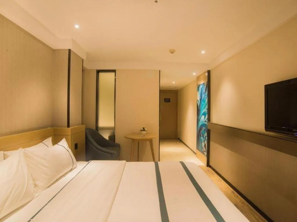 Bed in City Comfort Inn Liuzhou Wuxing Walking Street Zhonghuan Tower