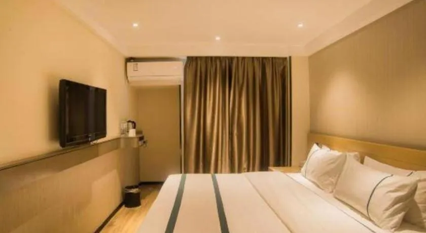Bed in City Comfort Inn Liuzhou Wuxing Walking Street Zhonghuan Tower