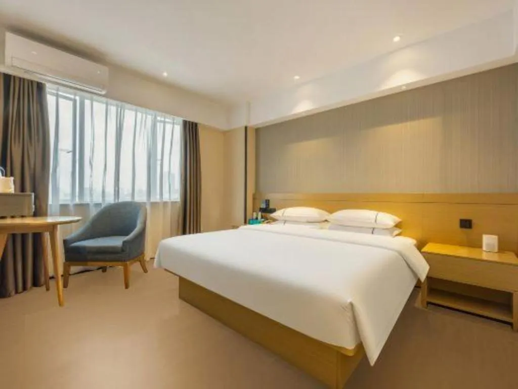 Bed in City Comfort Inn Liuzhou Wuxing Walking Street Zhonghuan Tower