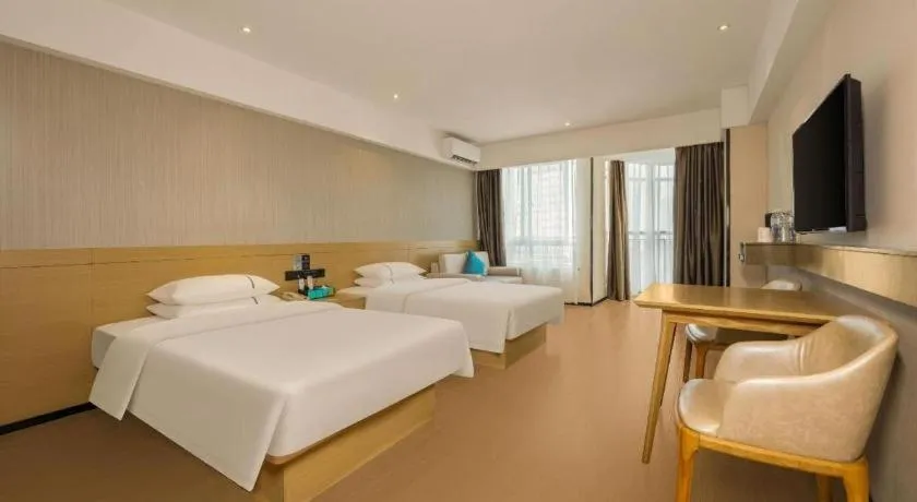 Bed in City Comfort Inn Liuzhou Wuxing Walking Street Zhonghuan Tower
