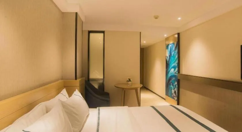 Bed in City Comfort Inn Liuzhou Wuxing Walking Street Zhonghuan Tower