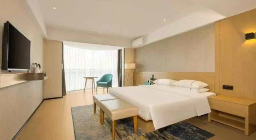 Bed in City Comfort Inn Liuzhou Wuxing Walking Street Zhonghuan Tower