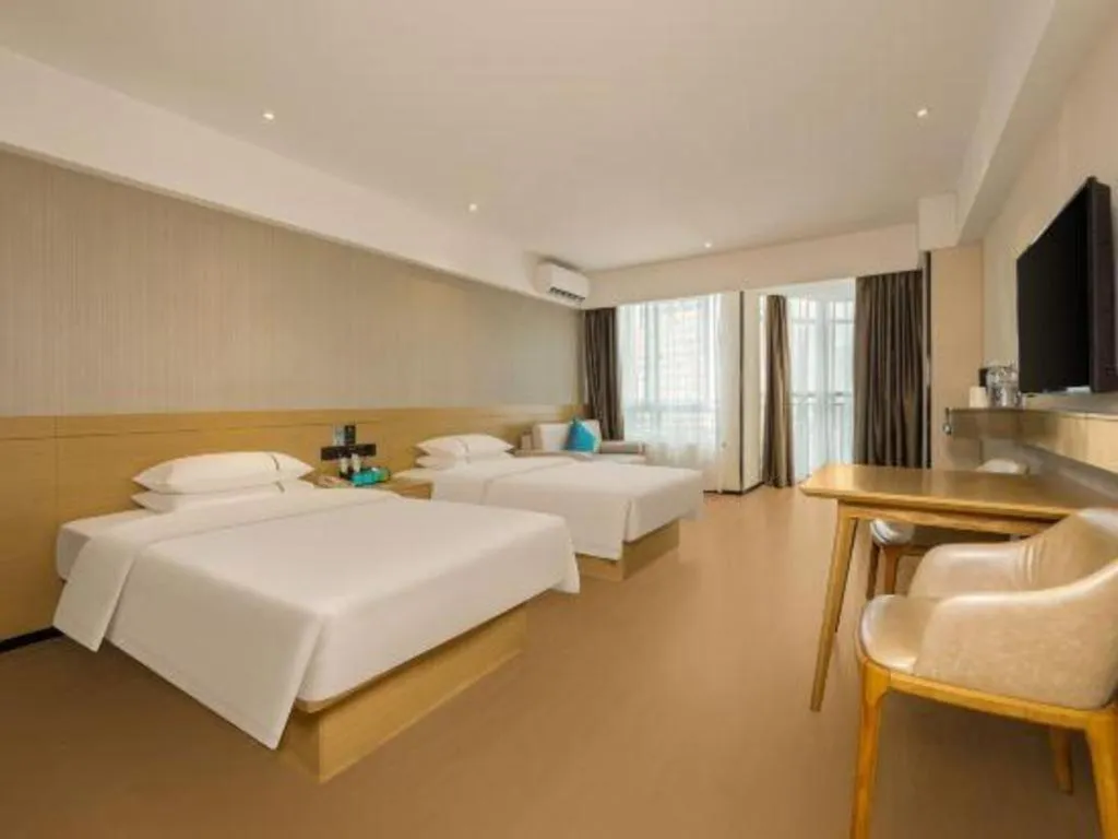 Bed in City Comfort Inn Liuzhou Wuxing Walking Street Zhonghuan Tower