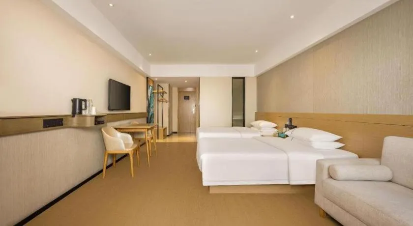 Bed in City Comfort Inn Liuzhou Wuxing Walking Street Zhonghuan Tower