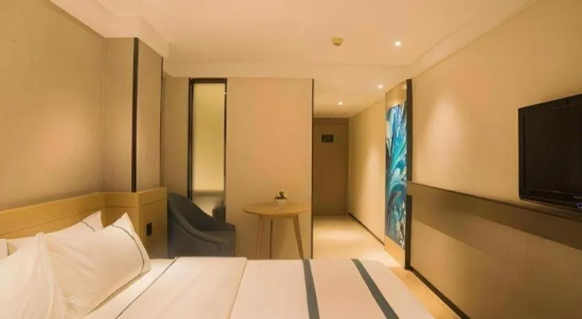 Bed in City Comfort Inn Liuzhou Wuxing Walking Street Zhonghuan Tower