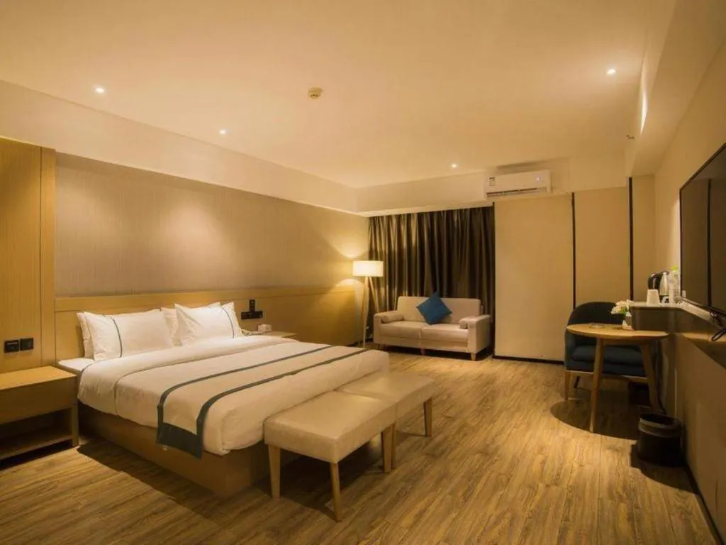 Bed in City Comfort Inn Liuzhou Wuxing Walking Street Zhonghuan Tower