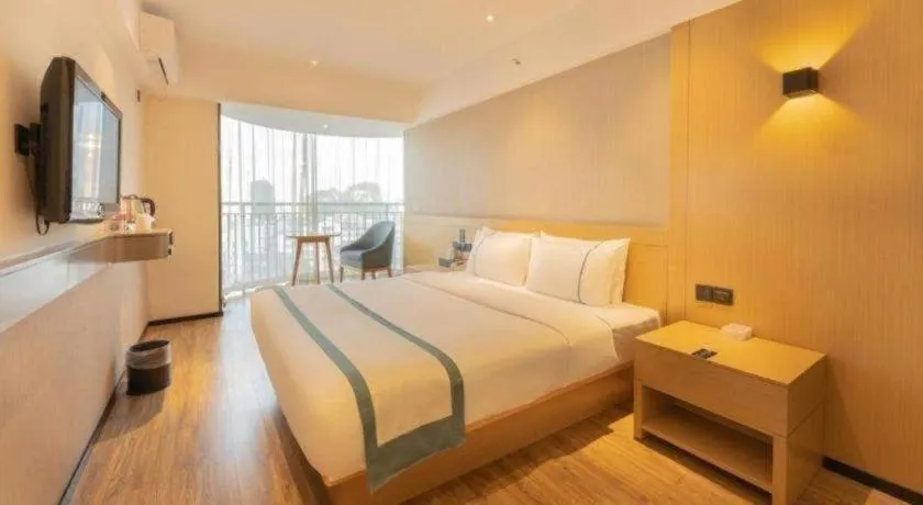 Bed in City Comfort Inn Liuzhou Wuxing Walking Street Zhonghuan Tower