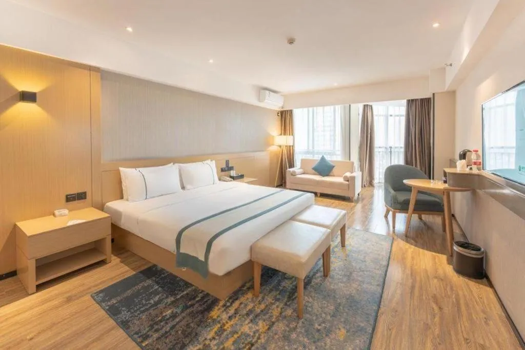 Bed in City Comfort Inn Liuzhou Wuxing Walking Street Zhonghuan Tower