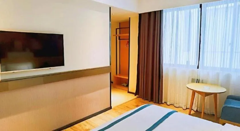 Bed in City Comfort Inn Hezhou Huangyao Ancient Town