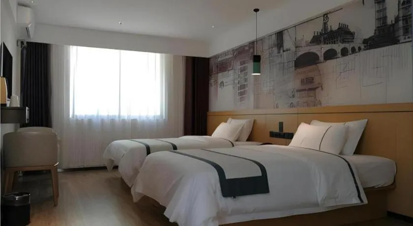 Bed in City Comfort Inn Hezhou Huangyao Ancient Town