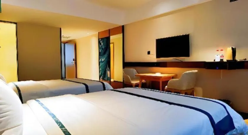 Bed in City Comfort Inn Hezhou Huangyao Ancient Town