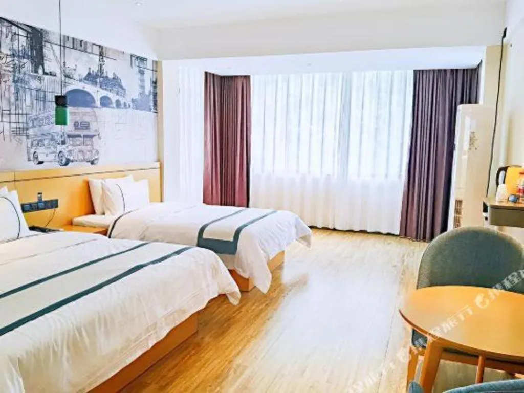 Bed in City Comfort Inn Hezhou Huangyao Ancient Town