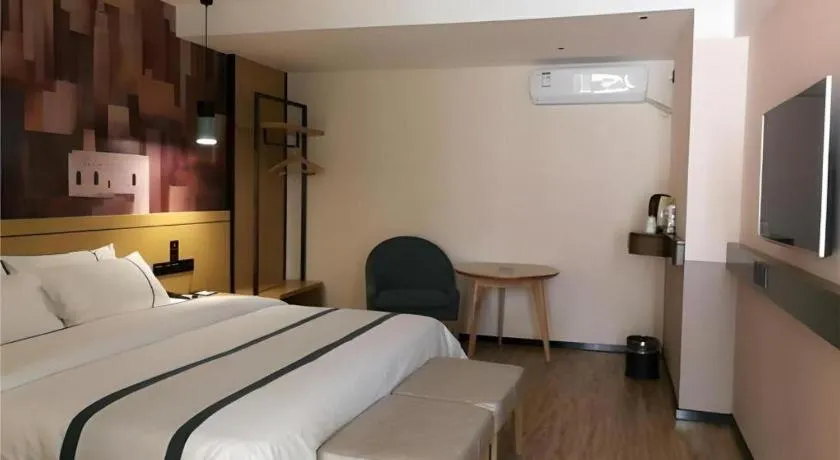 Bed in City Comfort Inn Hezhou Huangyao Ancient Town