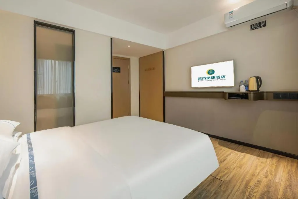 Bed in City Comfort Inn Hezhou Huangyao Ancient Town