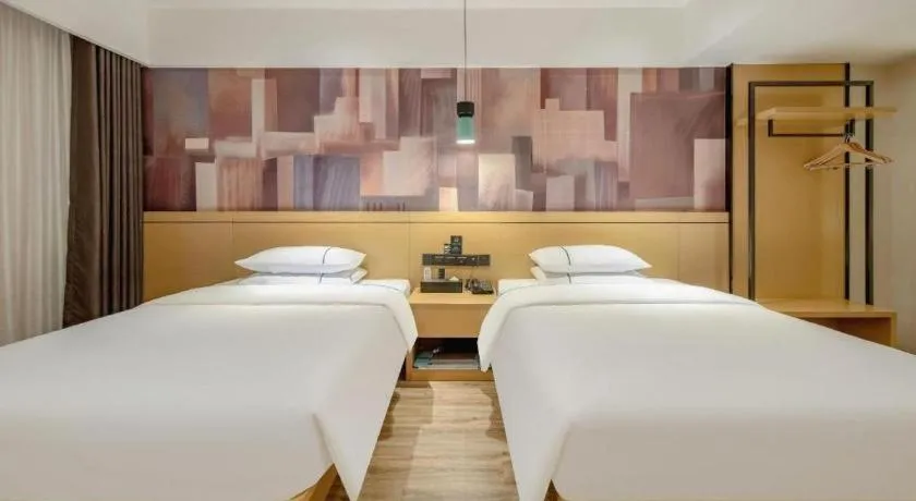 Bed in City Comfort Inn Hezhou Huangyao Ancient Town