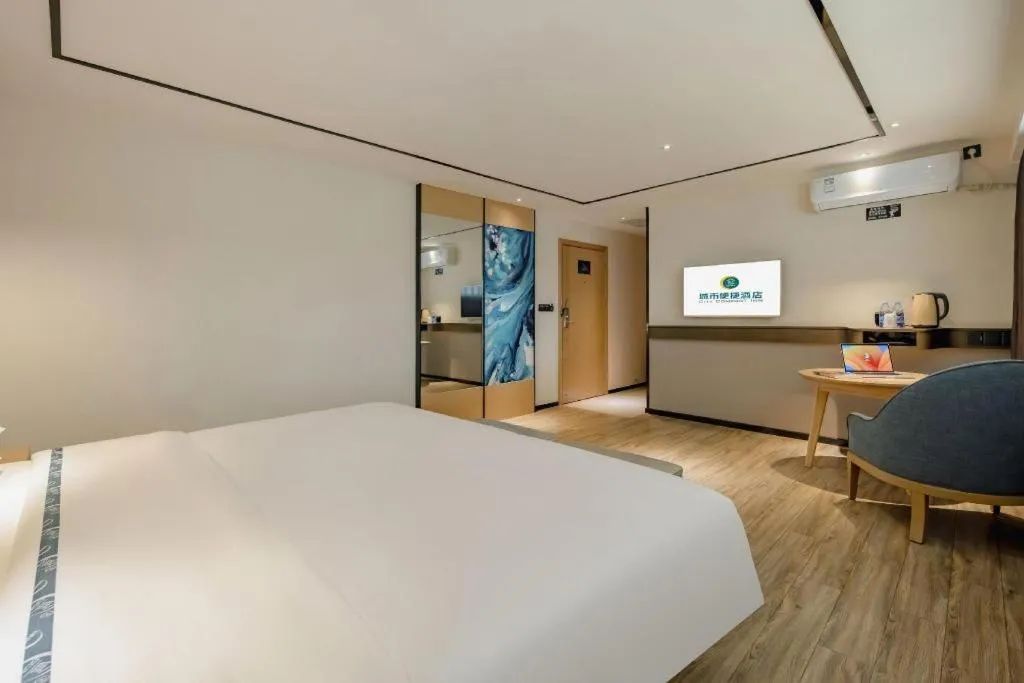 Bed in City Comfort Inn Hezhou Huangyao Ancient Town