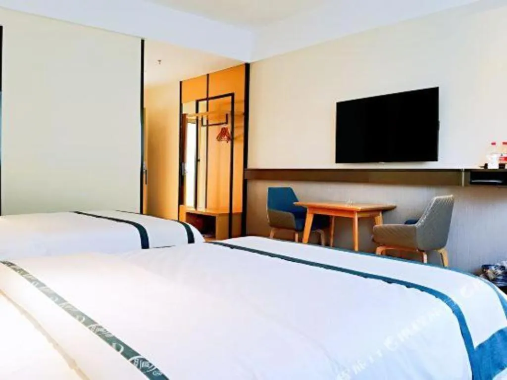 Bed in City Comfort Inn Hezhou Huangyao Ancient Town