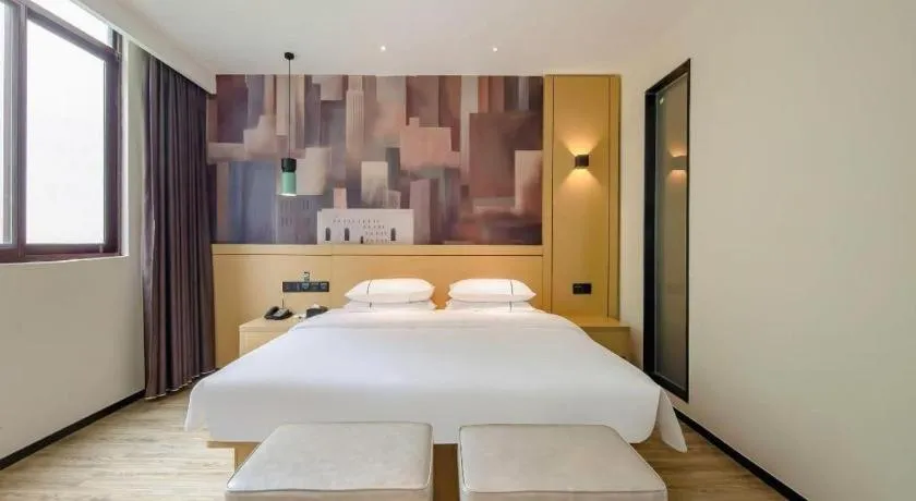 Bed in City Comfort Inn Hezhou Huangyao Ancient Town