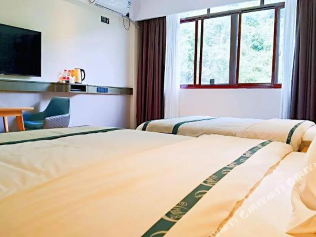 Bed in City Comfort Inn Hezhou Huangyao Ancient Town