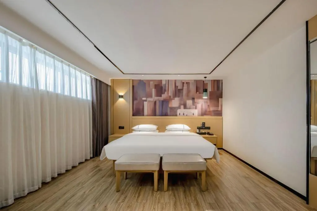 Bed in City Comfort Inn Hezhou Huangyao Ancient Town