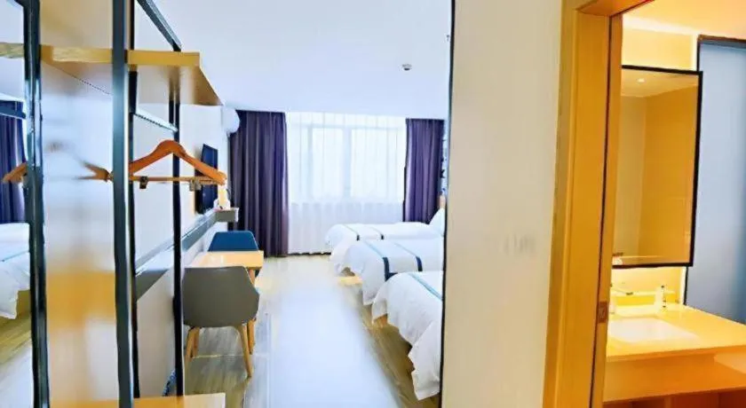 Bed in City Comfort Inn Hezhou Huangyao Ancient Town