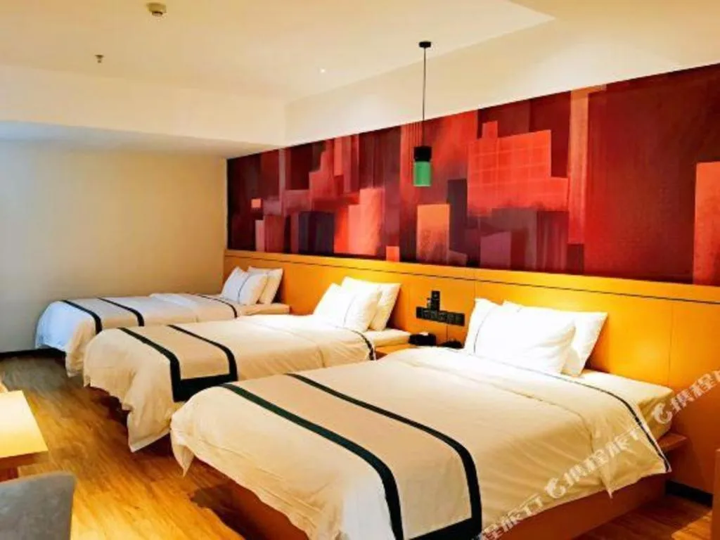 Bed in City Comfort Inn Hezhou Huangyao Ancient Town