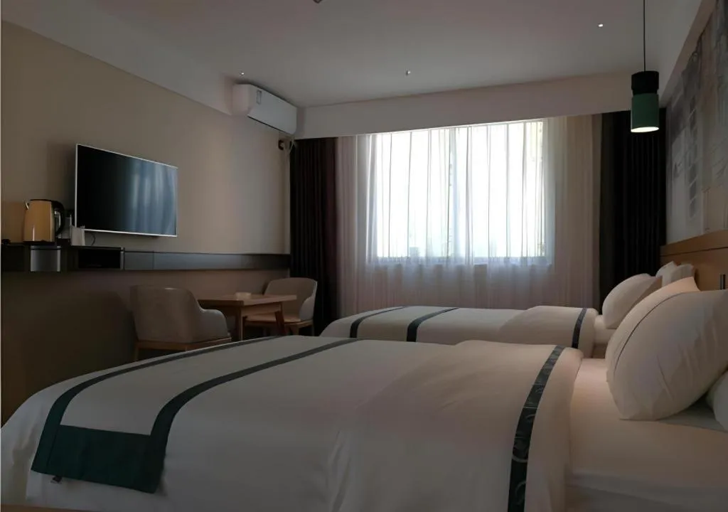 Bed in City Comfort Inn Hezhou Huangyao Ancient Town