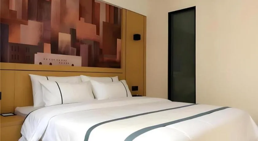 Bed in City Comfort Inn Hezhou Huangyao Ancient Town