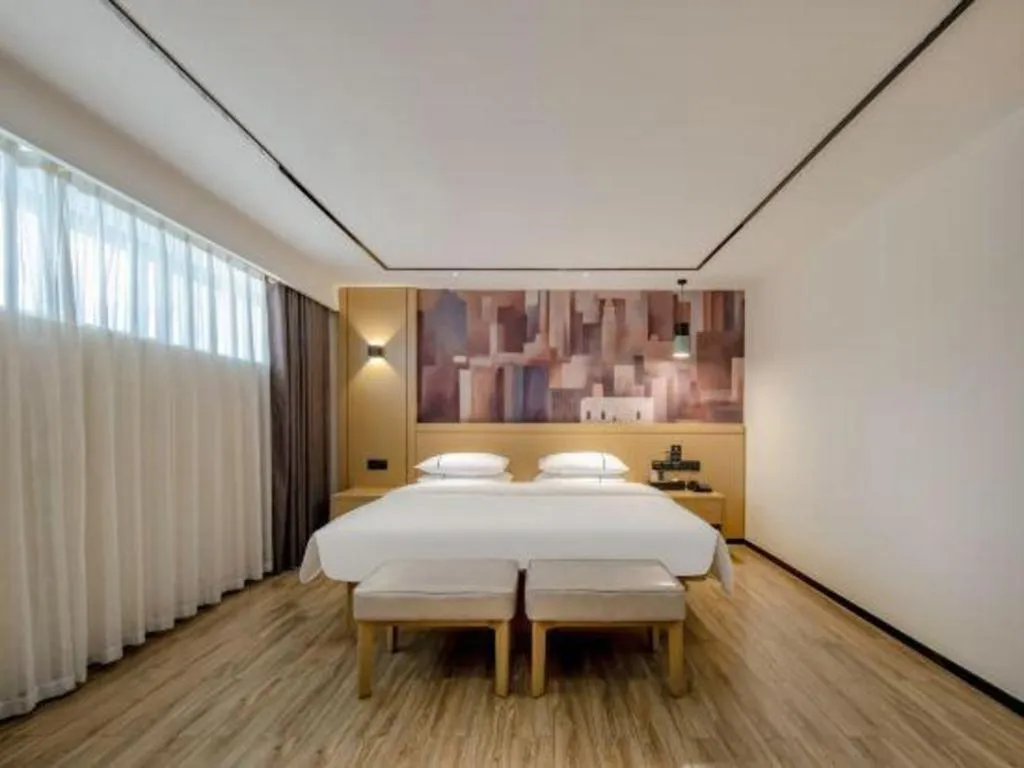 Bed in City Comfort Inn Hezhou Huangyao Ancient Town