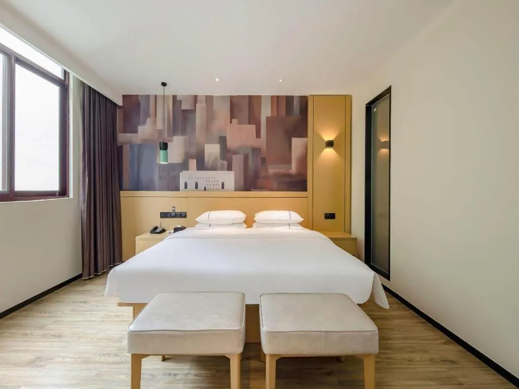 Bed in City Comfort Inn Hezhou Huangyao Ancient Town