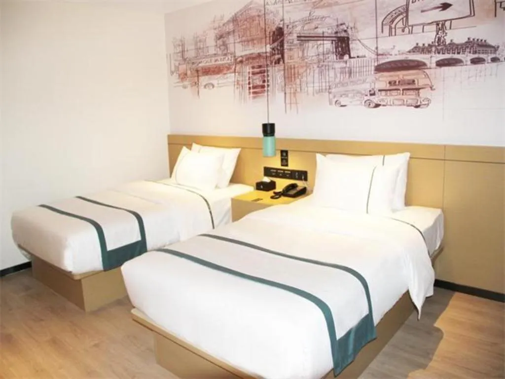 Bed in City Comfort Inn Jinzhou Bohai University Wanda Plaza