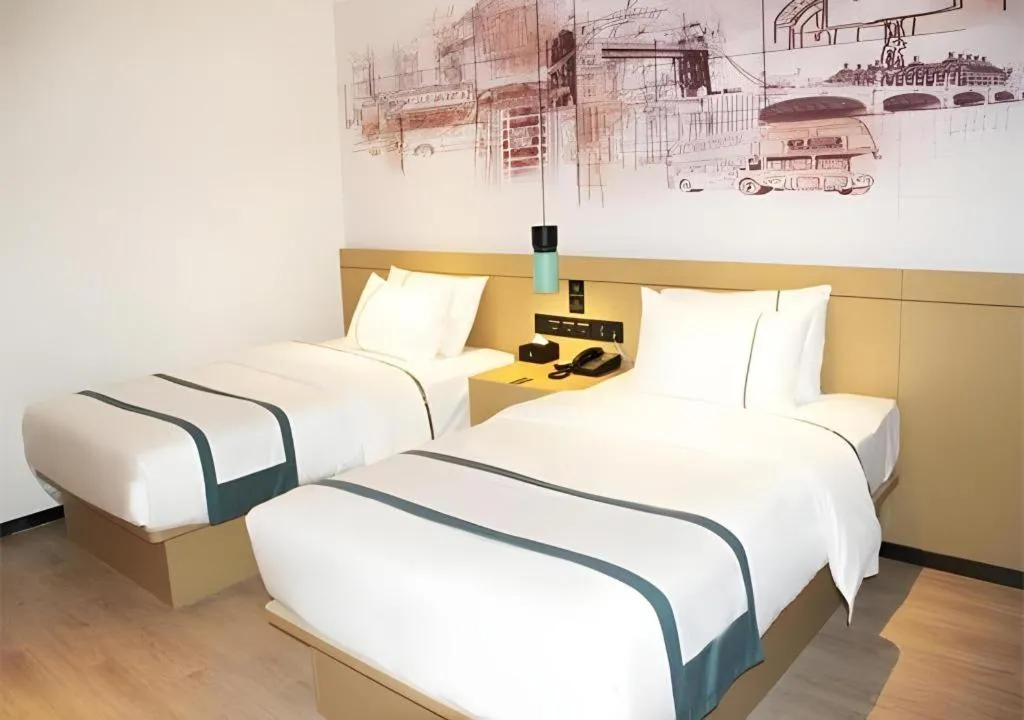 Bed in City Comfort Inn Jinzhou Bohai University Wanda Plaza