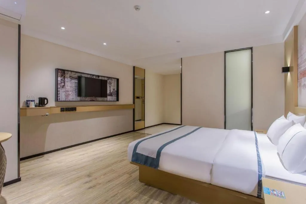 Bed in City Comfort Inn Jinzhou Bohai University Wanda Plaza