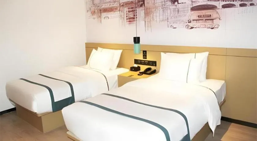 Bed in City Comfort Inn Jinzhou Bohai University Wanda Plaza
