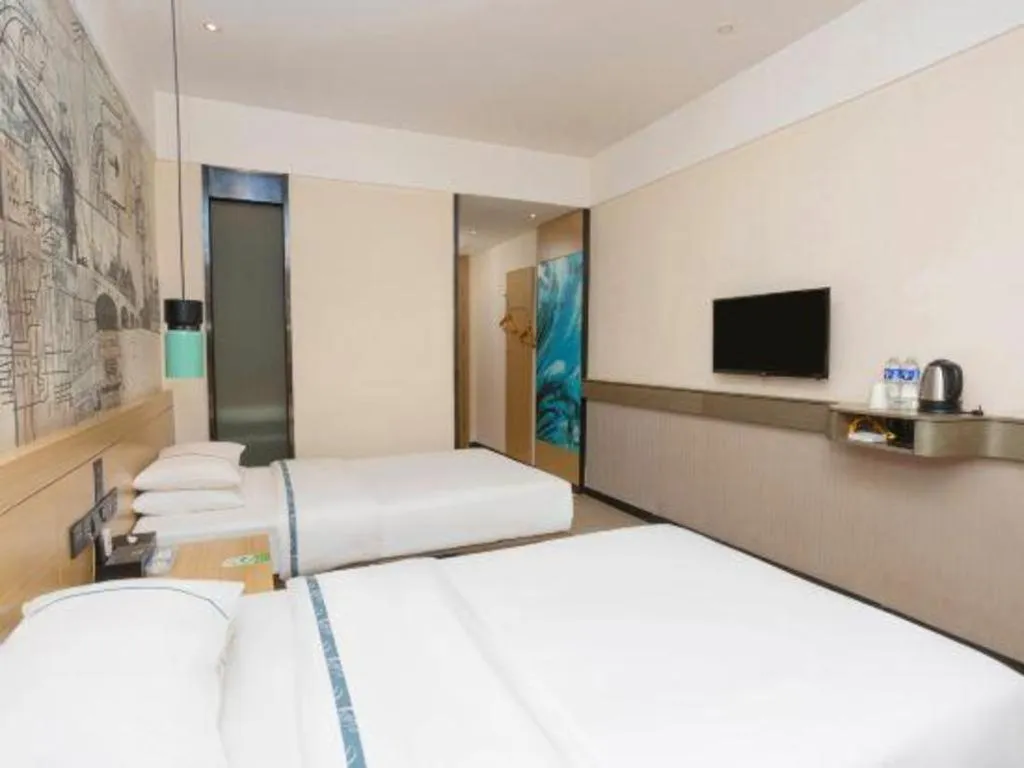 Bed in City Comfort Inn Huanggang Luotian Yishui Waitan