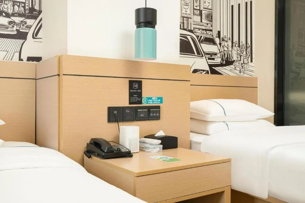 Bed in City Comfort Inn Liuzhou Chengzhong Wanda Haiguan