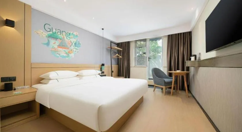 Bed in City Comfort Inn Liuzhou Chengzhong Wanda Haiguan