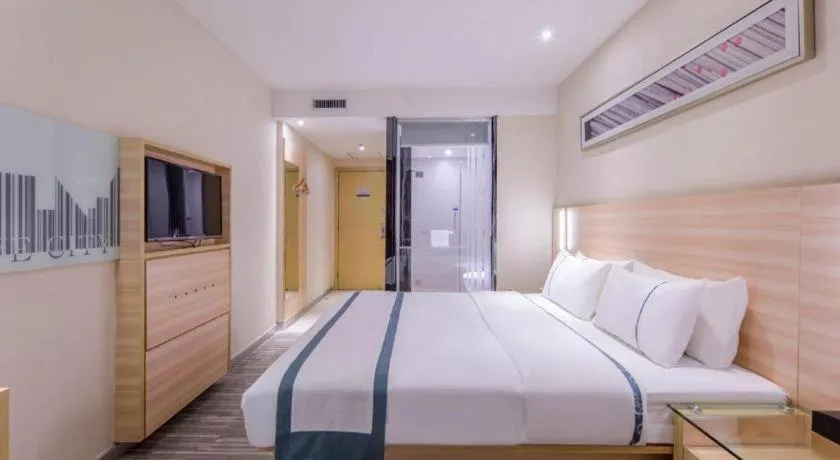 Bed in City Comfort Inn Liuzhou Chengzhong Wanda Haiguan