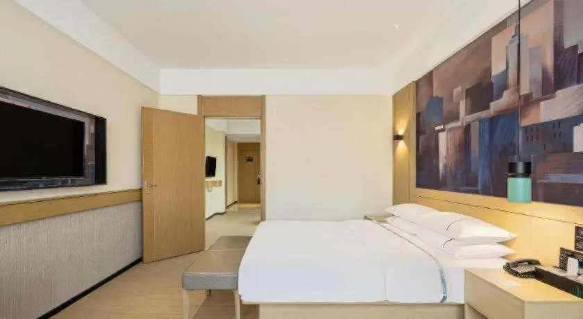 Bed in City Comfort Inn Liuzhou Chengzhong Wanda Haiguan