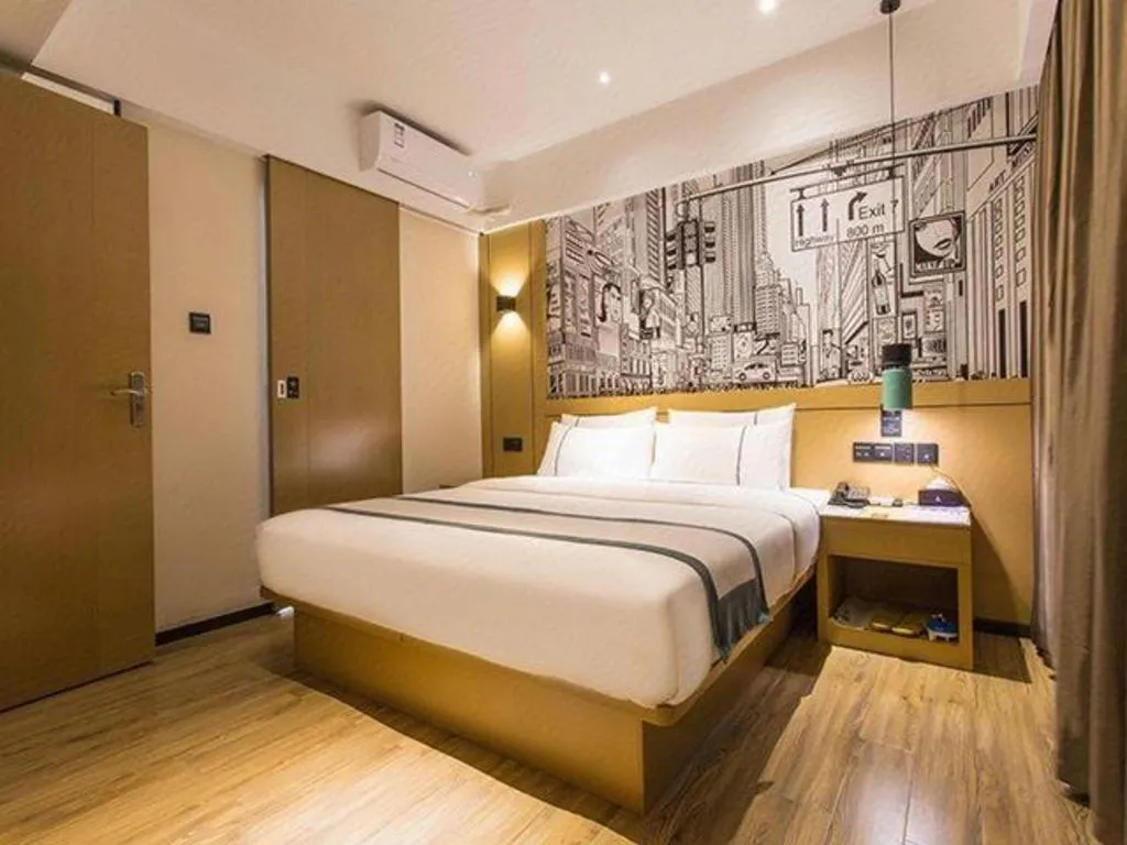 Bed in City Comfort Inn Liuzhou Chengzhong Wanda Haiguan