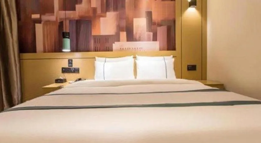 Bed in City Comfort Inn Liuzhou Chengzhong Wanda Haiguan