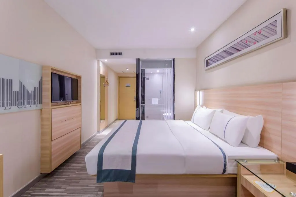 Bed in City Comfort Inn Liuzhou Chengzhong Wanda Haiguan