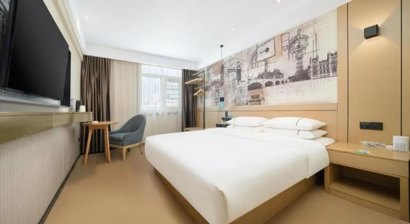 Bed in City Comfort Inn Liuzhou Chengzhong Wanda Haiguan