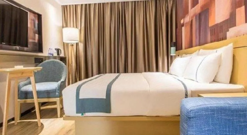 Bed in City Comfort Inn Liuzhou Chengzhong Wanda Haiguan