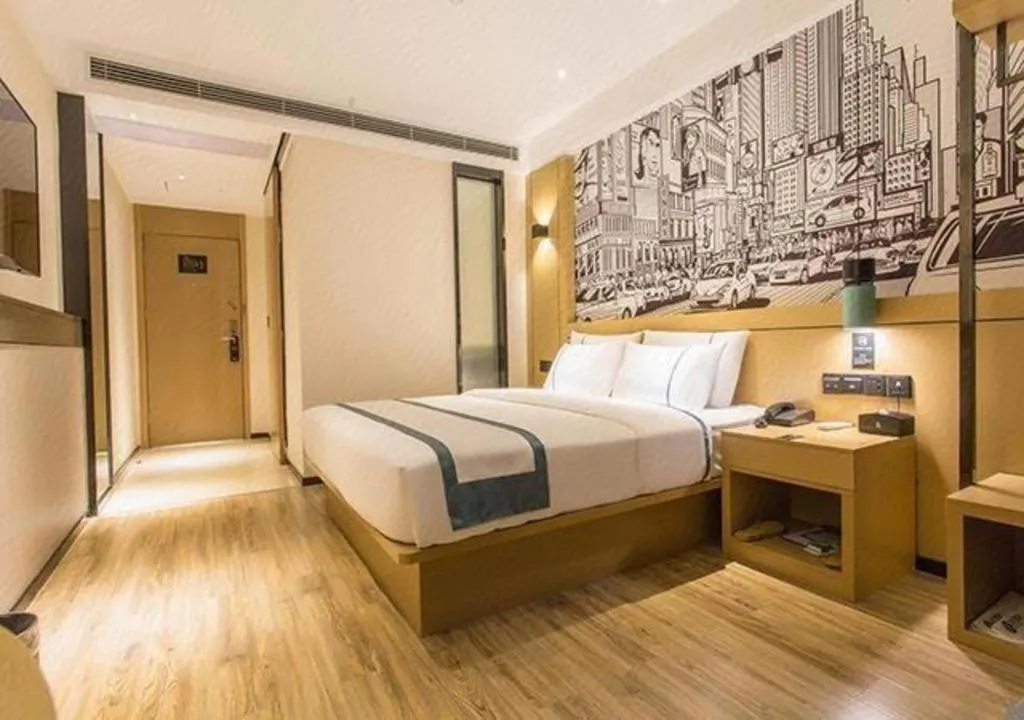 Bed in City Comfort Inn Liuzhou Chengzhong Wanda Haiguan