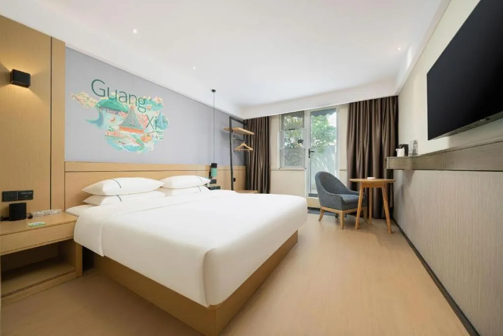 Bed in City Comfort Inn Liuzhou Chengzhong Wanda Haiguan